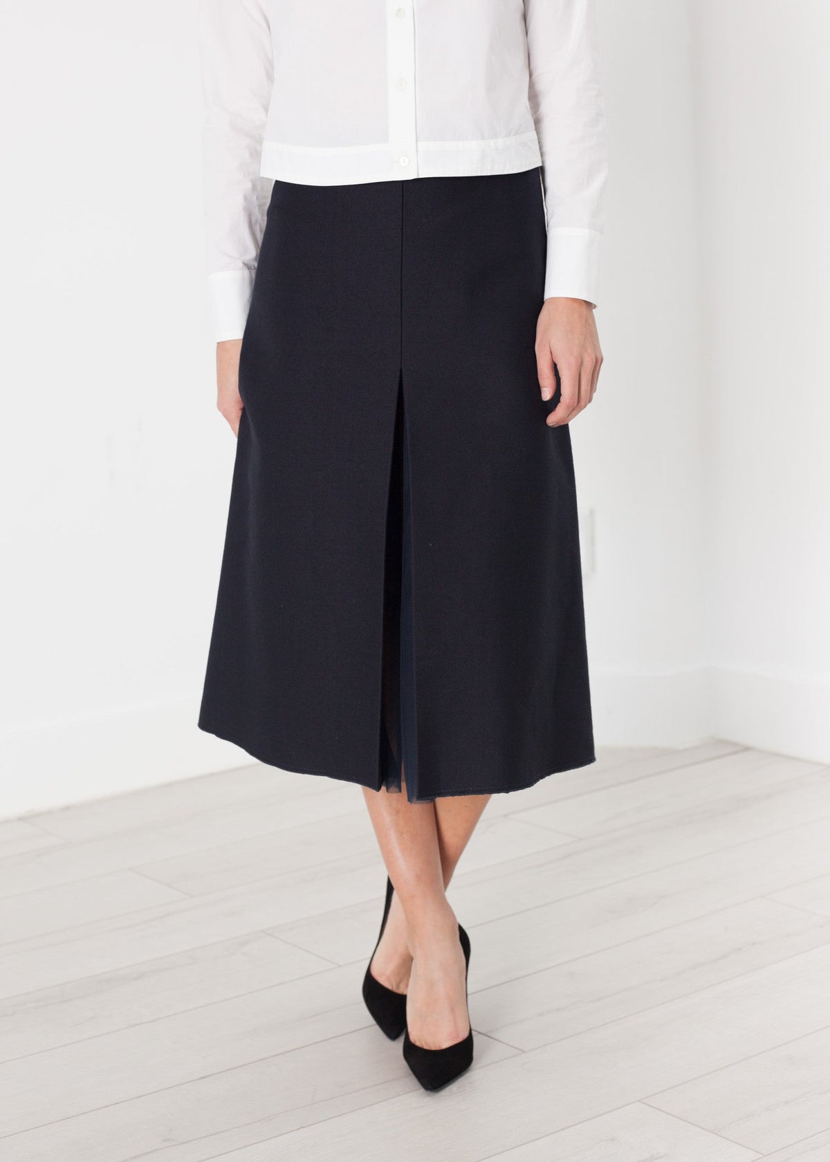 Navy Pleated Midi Skirt - sample outfit photograph